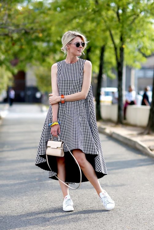 Round-sunglasses-checkered-dress-and-Adidas-Stan-Smith-trainers
